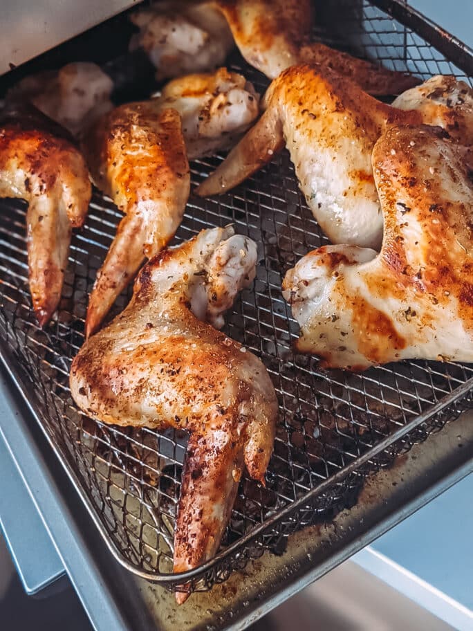 Crispy wings coming out of the air fryer