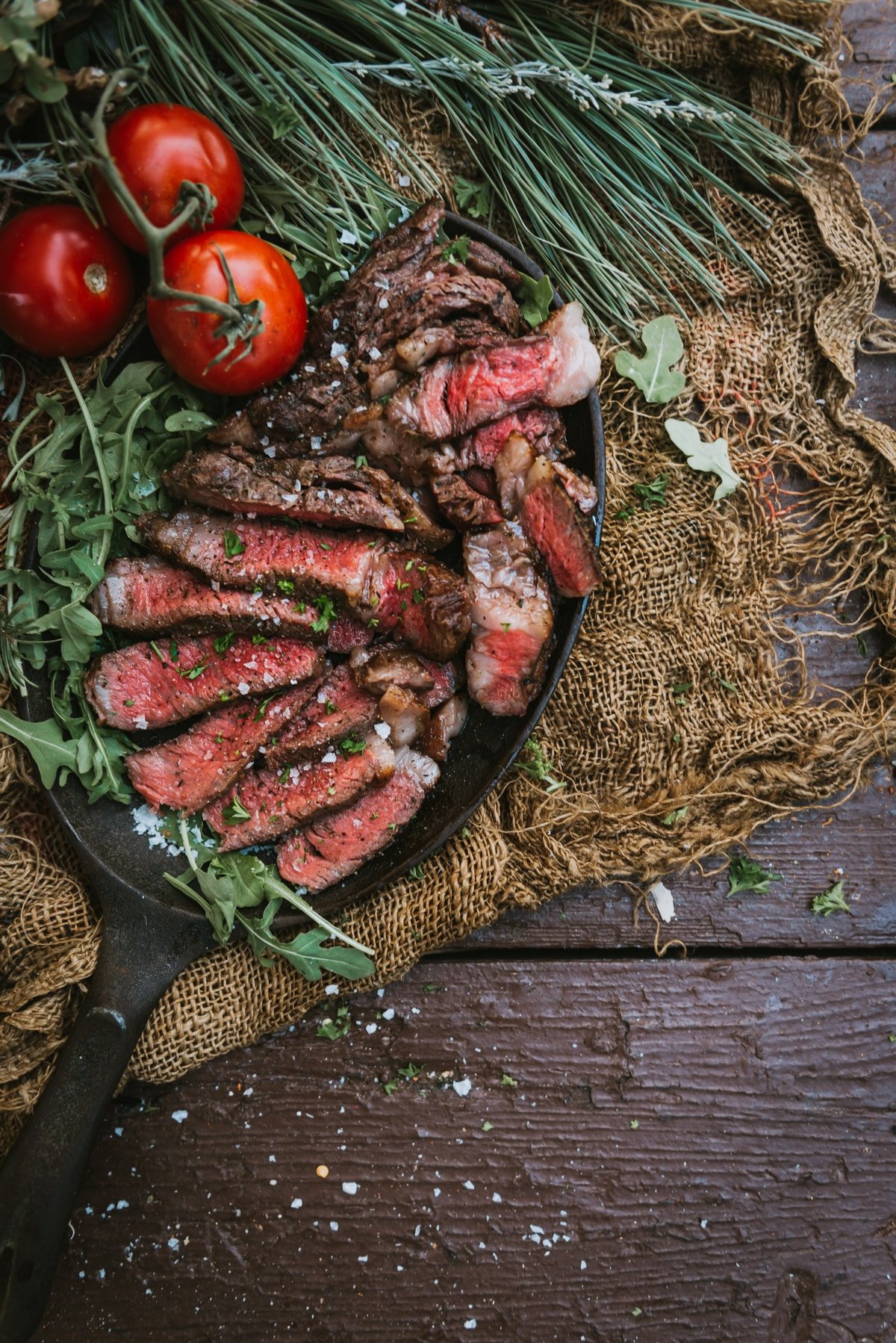 How to Cook Ribeye Steak on the Grill - Garnished Plate