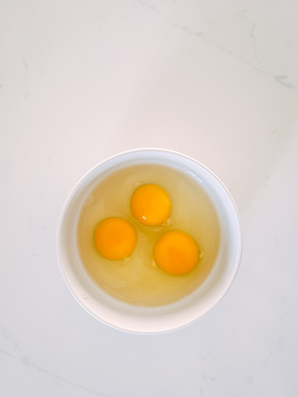 3 eggs in a bowl.
