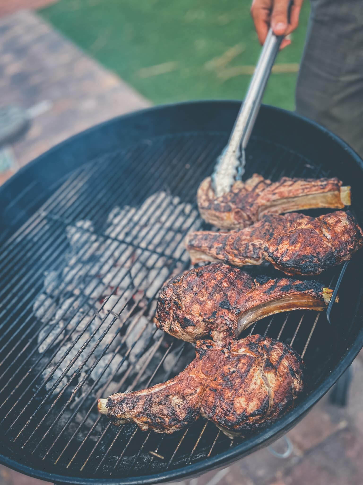 Veal chops on the indirect side of the grill. 