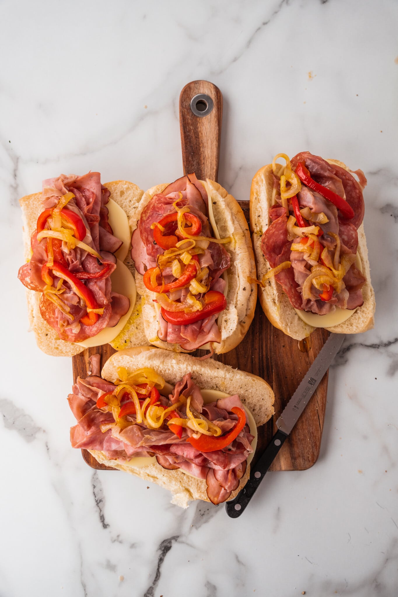 Cured Italian deli meats griddled in a single layer until the edges curl