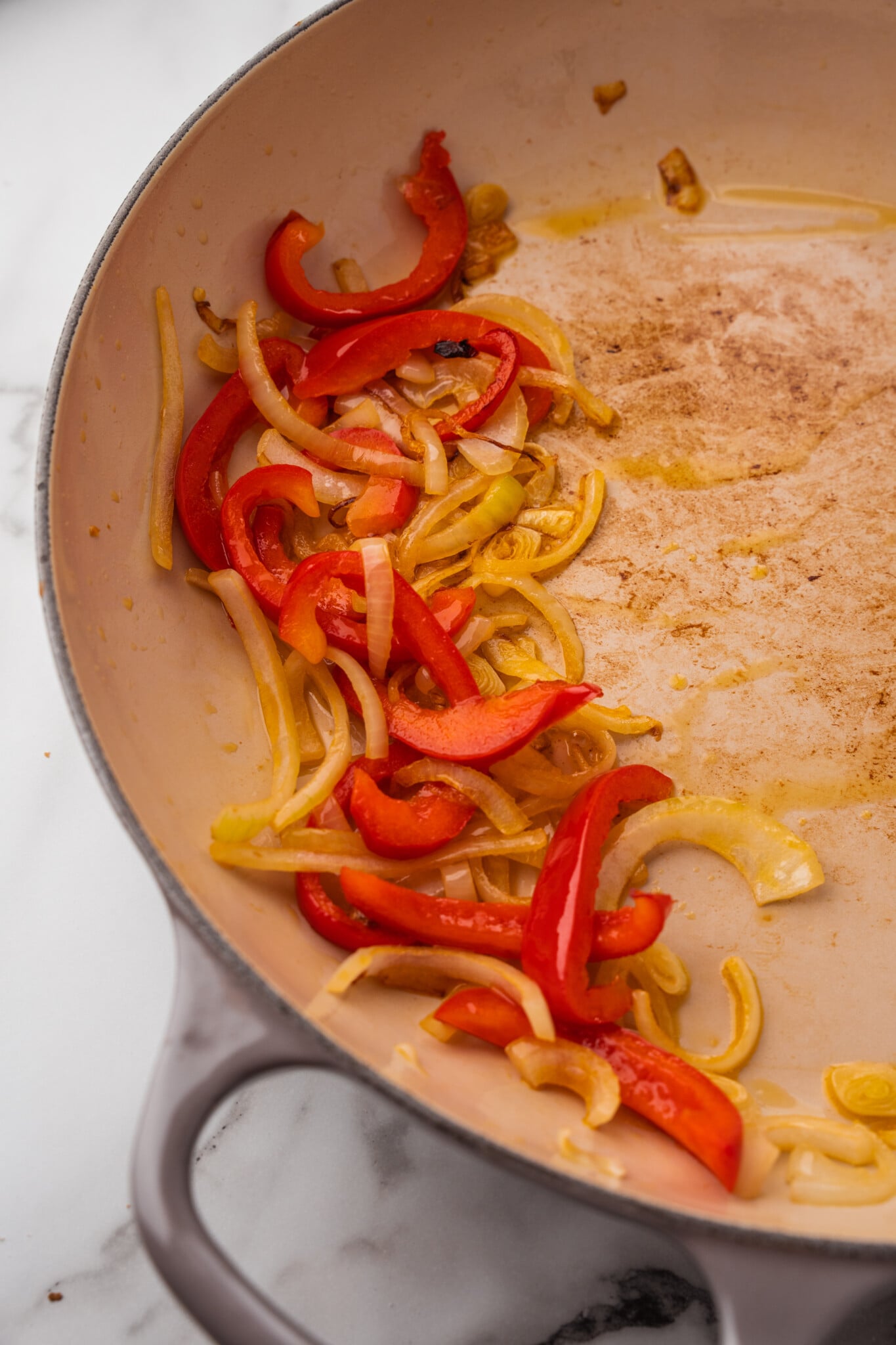 Provolone laid onto an oiled hoagie roll before the hot meat goes on