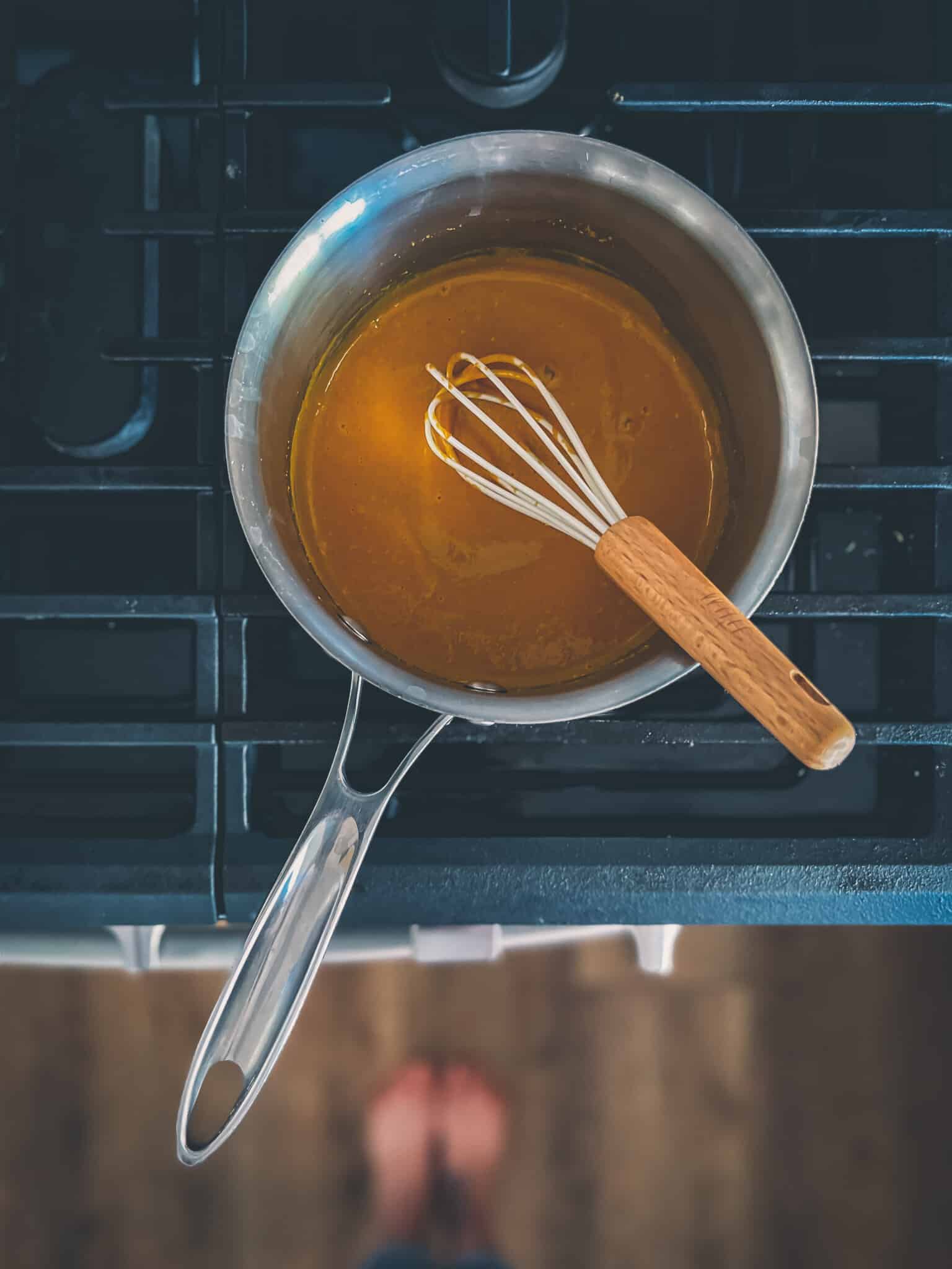 Whisk in a beautiful golden sauce of combined ingredients. 