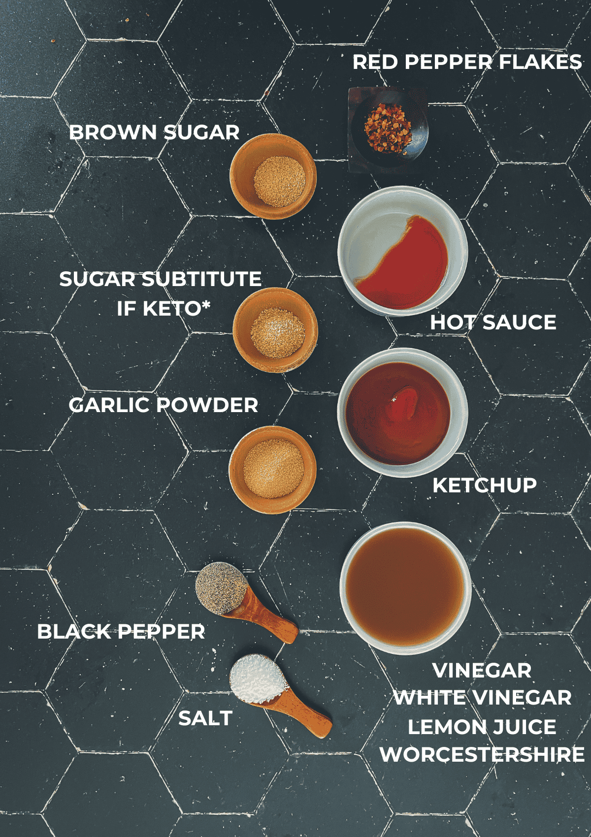 ingredients for vinegar based bbq sauce on a black background.