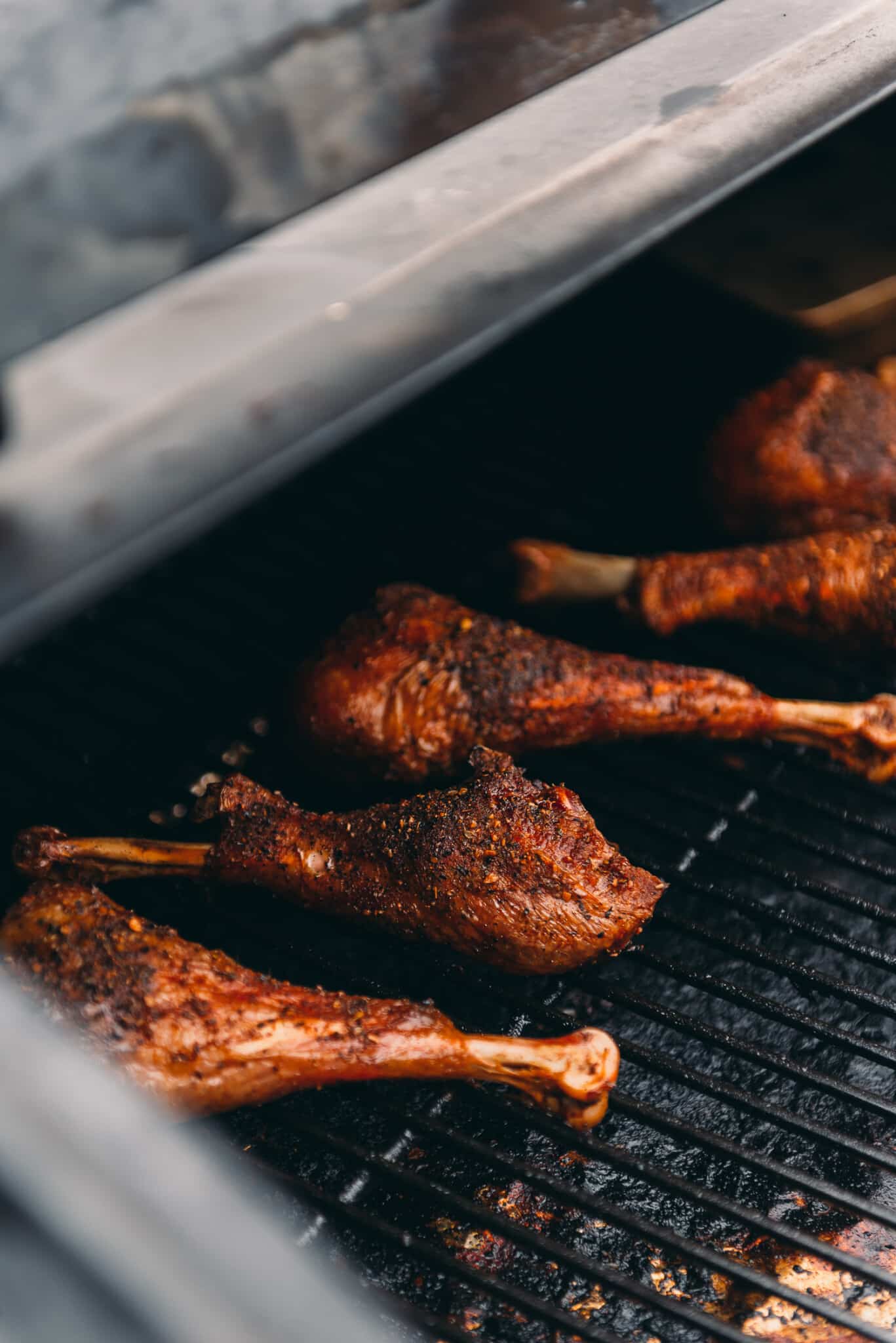 Beautiful golden brown turkey legs on a the smoker, 