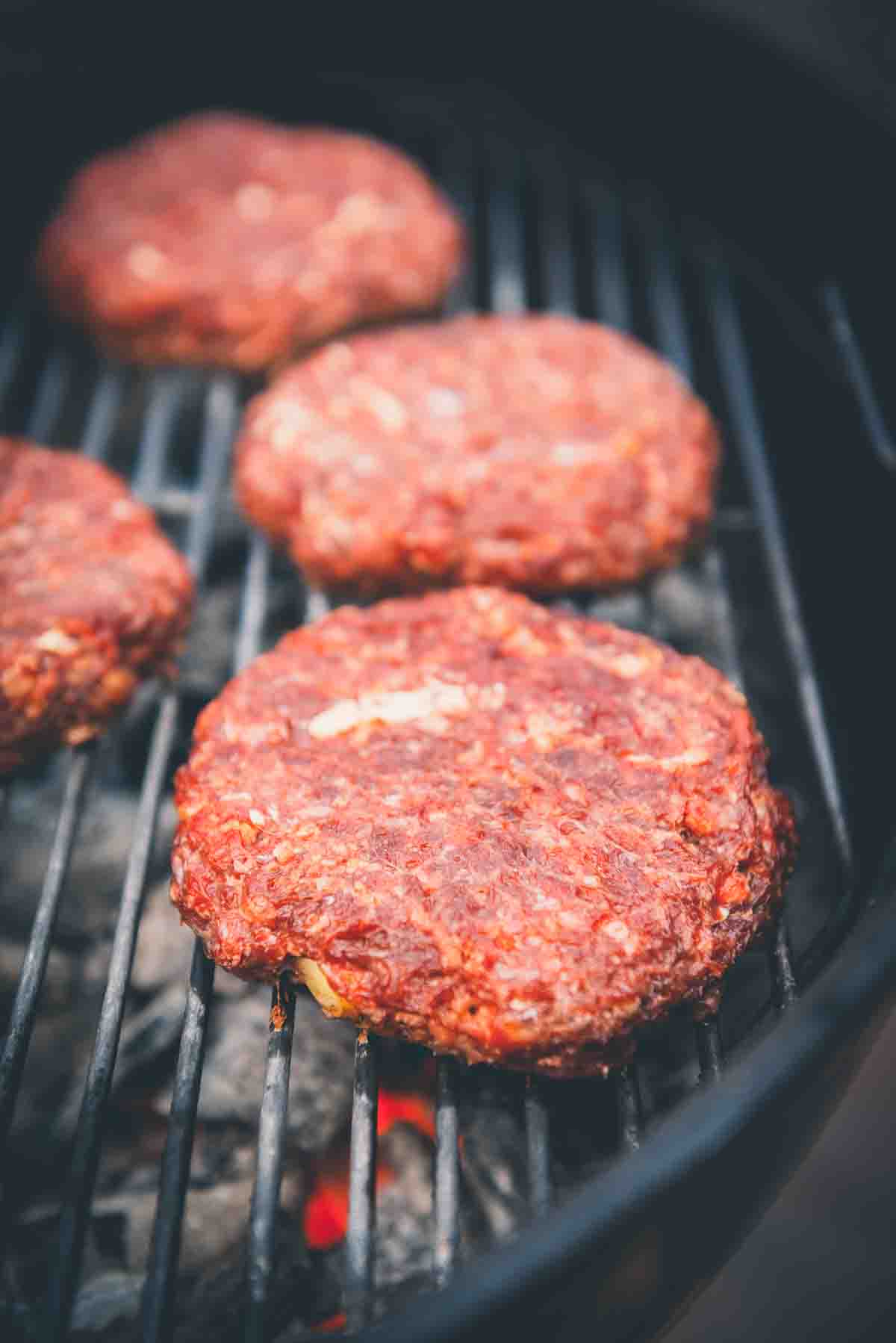 Close up of patties on the grill.