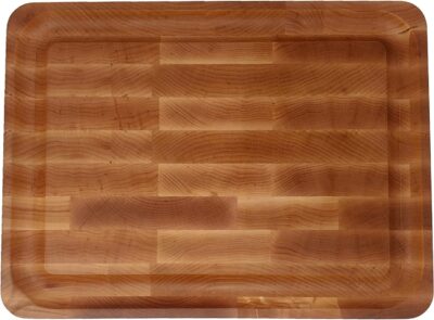 A square wooden cutting board, perfect for grilling enthusiasts, on a white background.