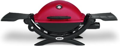 A red and black bbq grill, perfect for grilling gifts, on a white background.