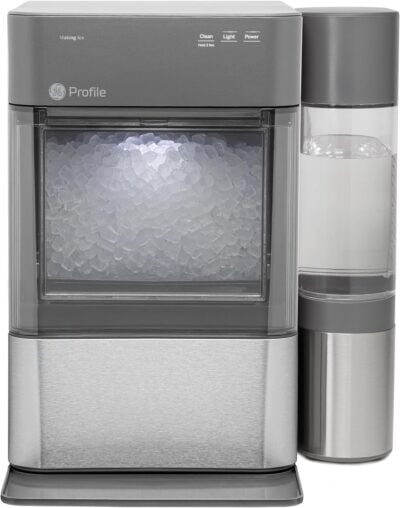 A silver ice maker accompanied by a water bottle, perfect for grilling enthusiasts.