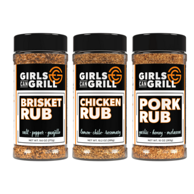 Three spice bottles labeled "Brisket Rub," "Chicken Rub," and "Pork Rub" from Girls Can Grill make perfect grilling gifts. They feature salt, pepper, guajillo, lemon, chile, rosemary, garlic, honey, and molasses.