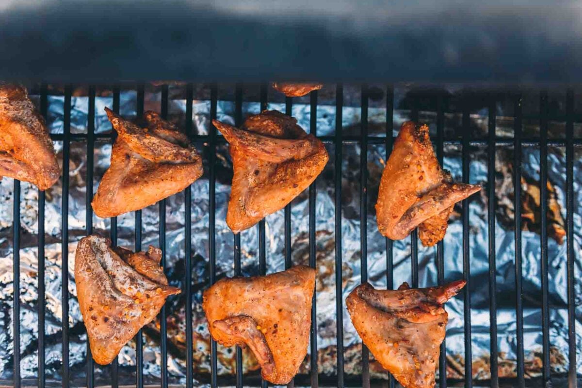 Close up of wings getting crispy dry skin. 
