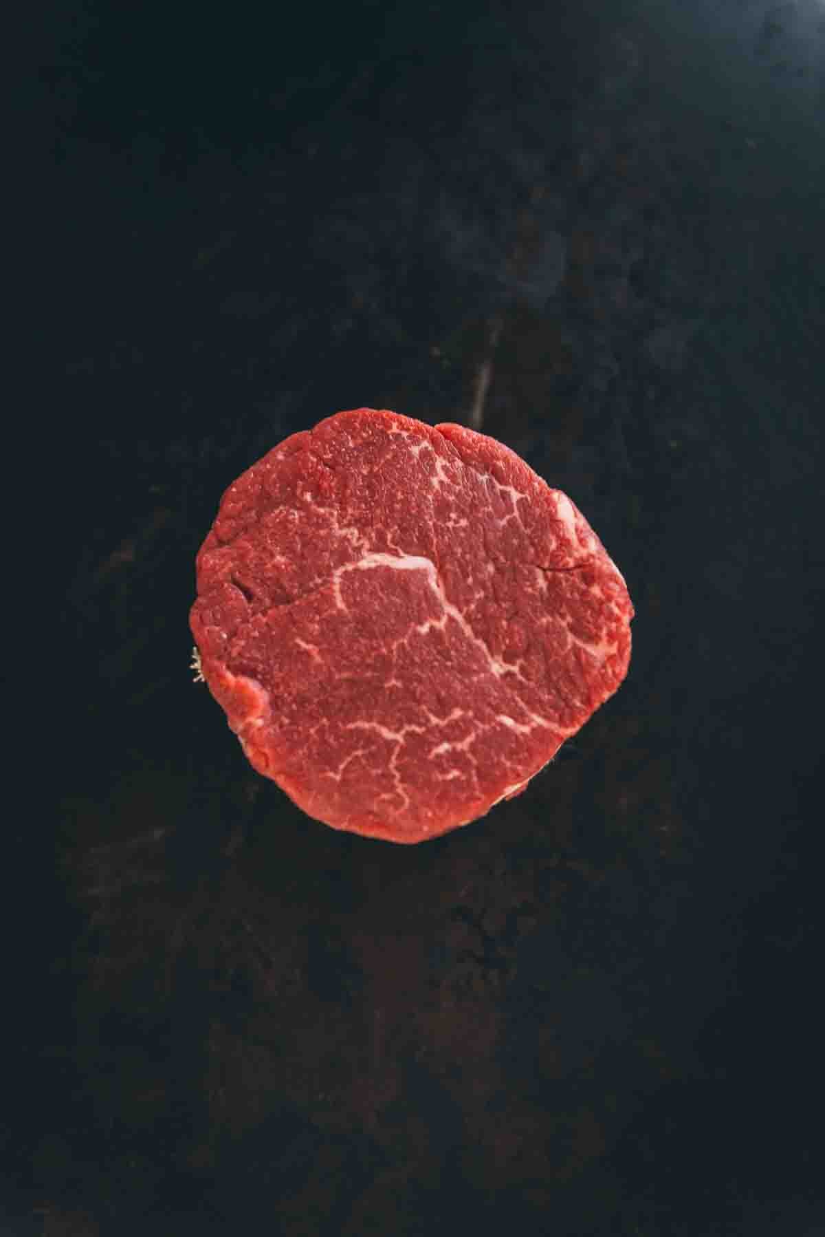 Tenderloin steak from above to show marbling. 