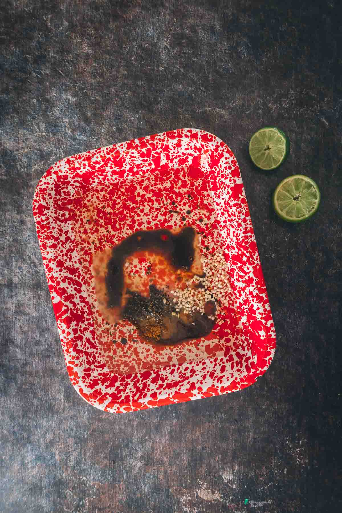 Enamel pan with ingredients added for the marinade. 