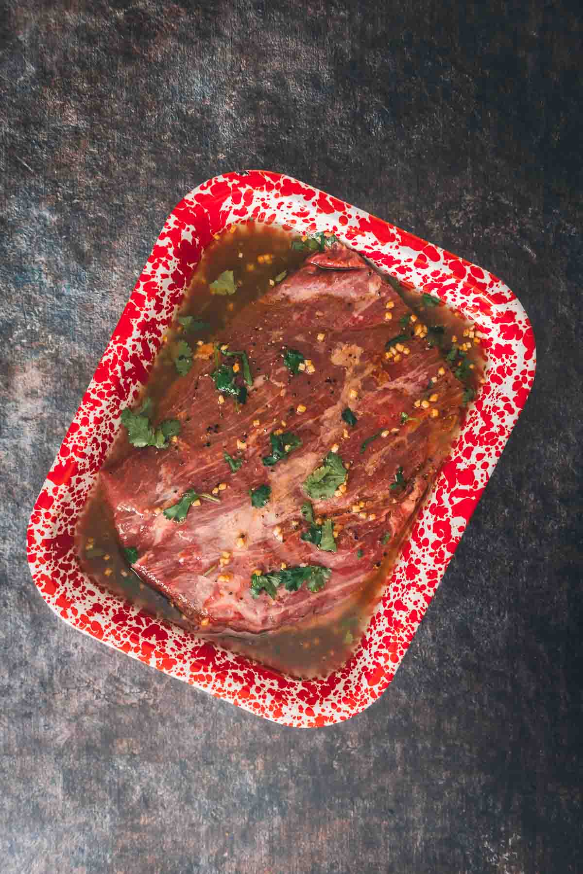 Flank steak marinating. 