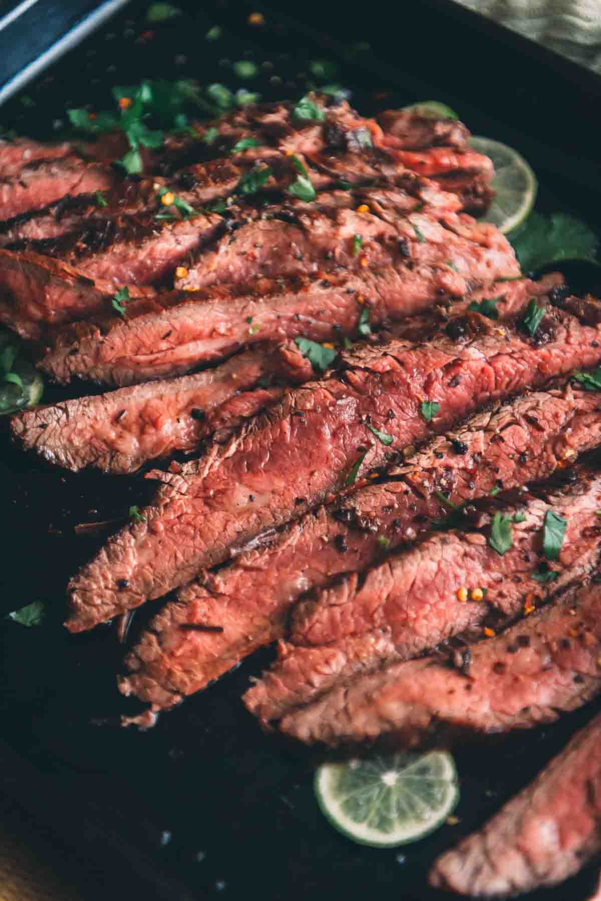 Grilled flank steak sliced thin for serving. 
