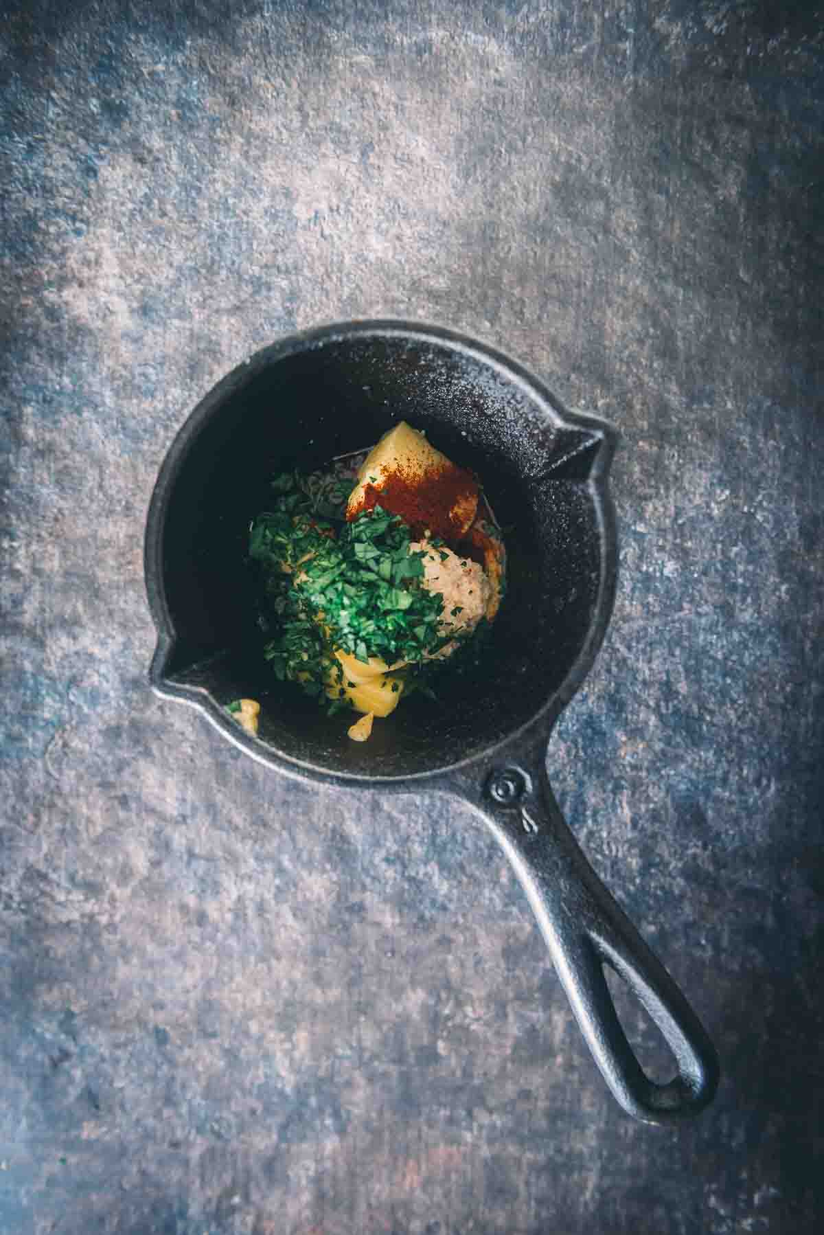 All the butter and ingredients in a small cast iron saucepan.