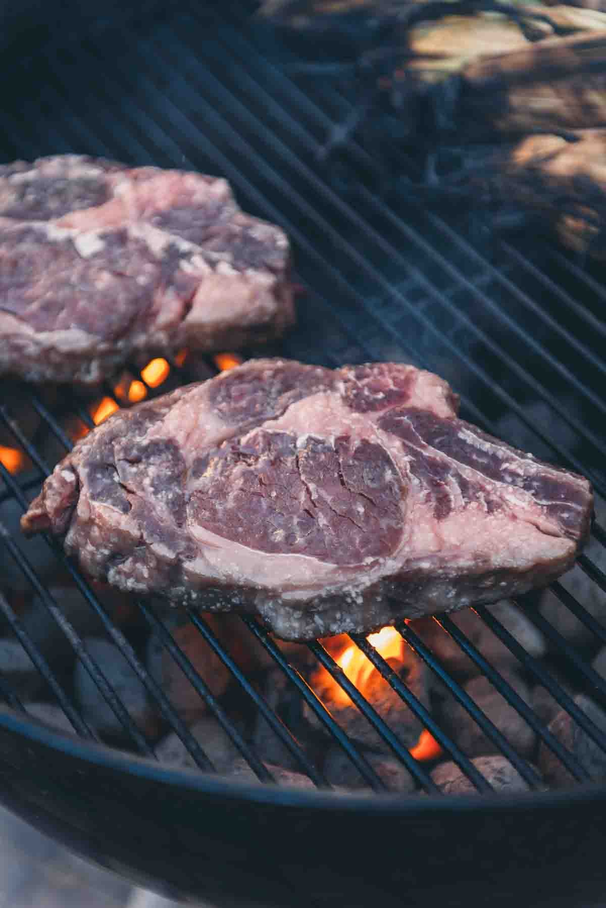 Ribeyes on the grill.