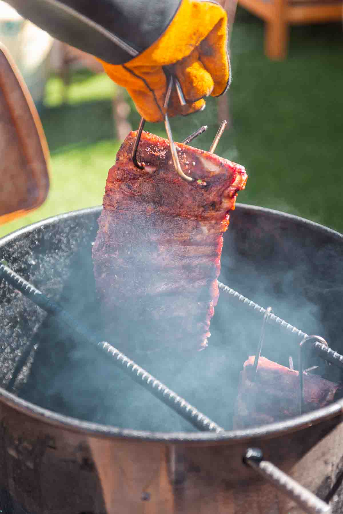 Rack of ribs coming out of the smoker.