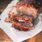 Ground deer meat meatloaf sliced into servings.