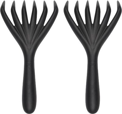 A pair of black spatulas on a white background.