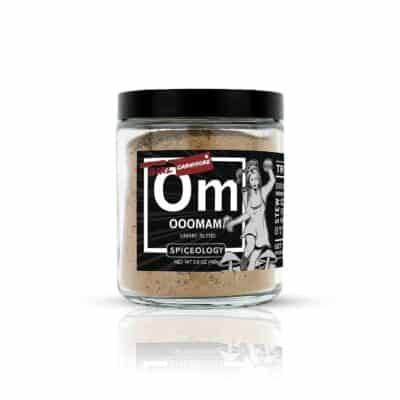 A jar of om cocoa powder on a white background.