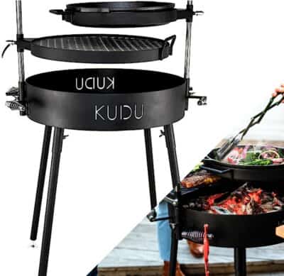 A barbecue grill with meat on it.
