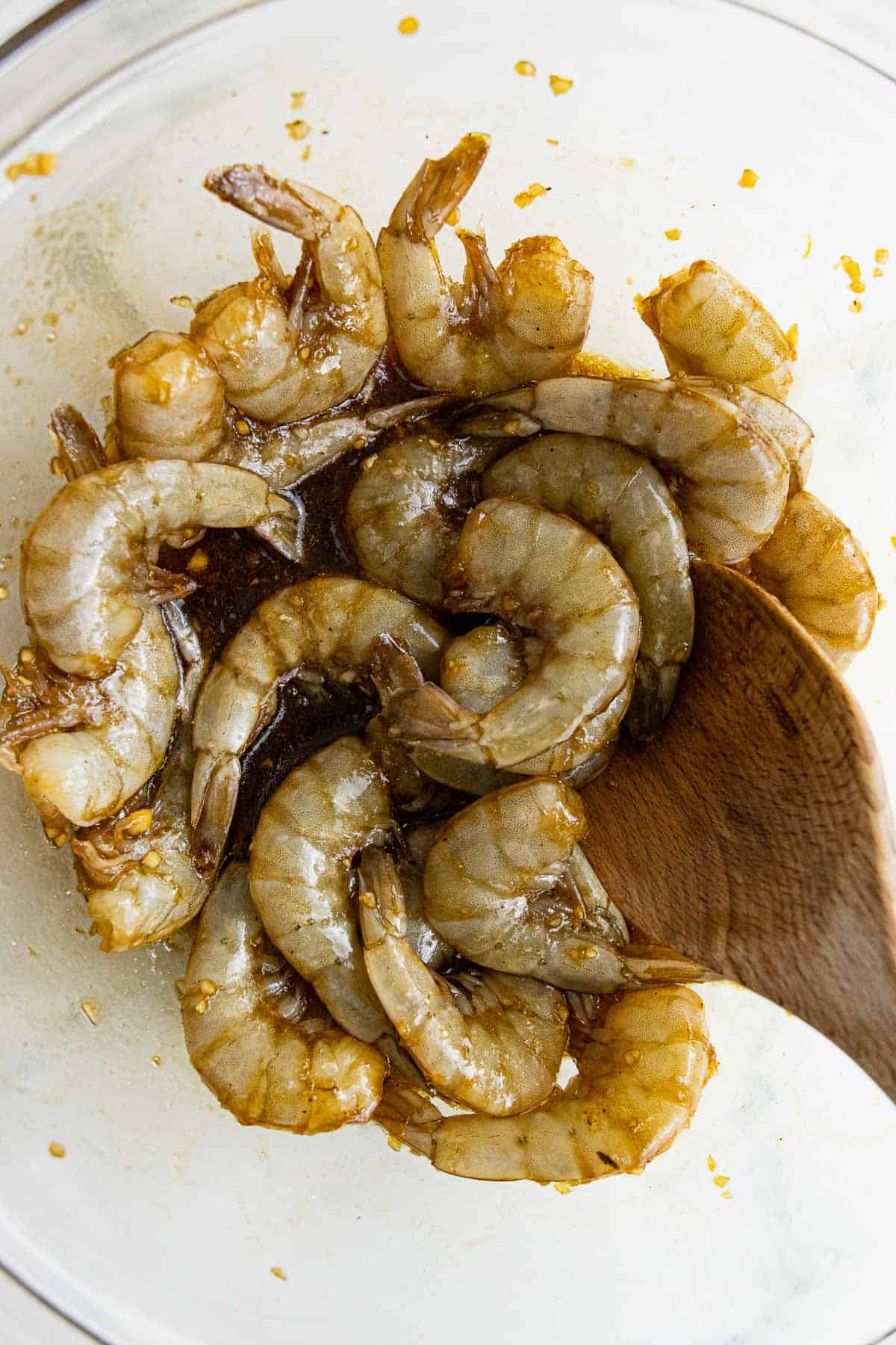 Raw shrimp mixed with soy sauce mixture.