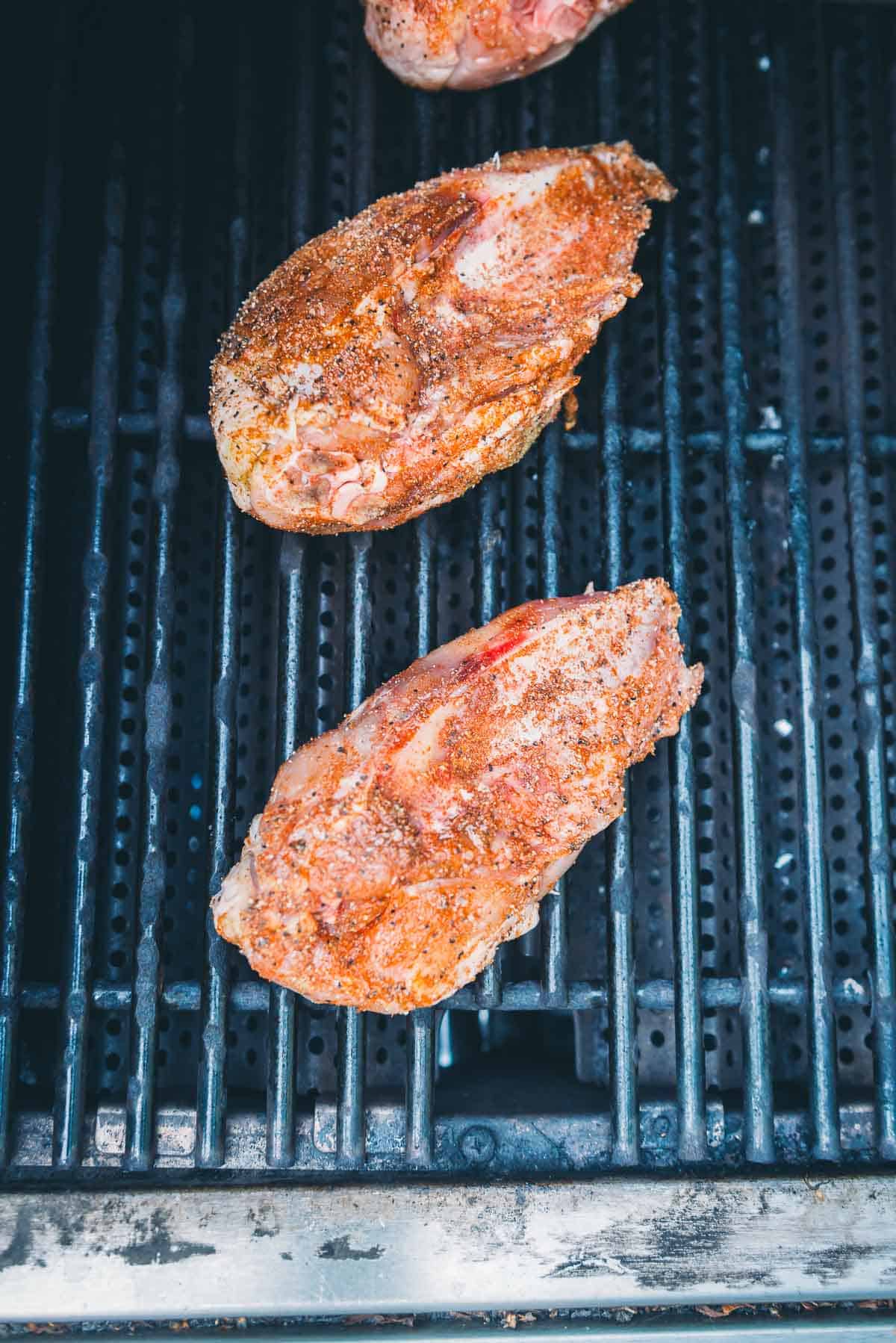 Chicken, skin side down on the grill.