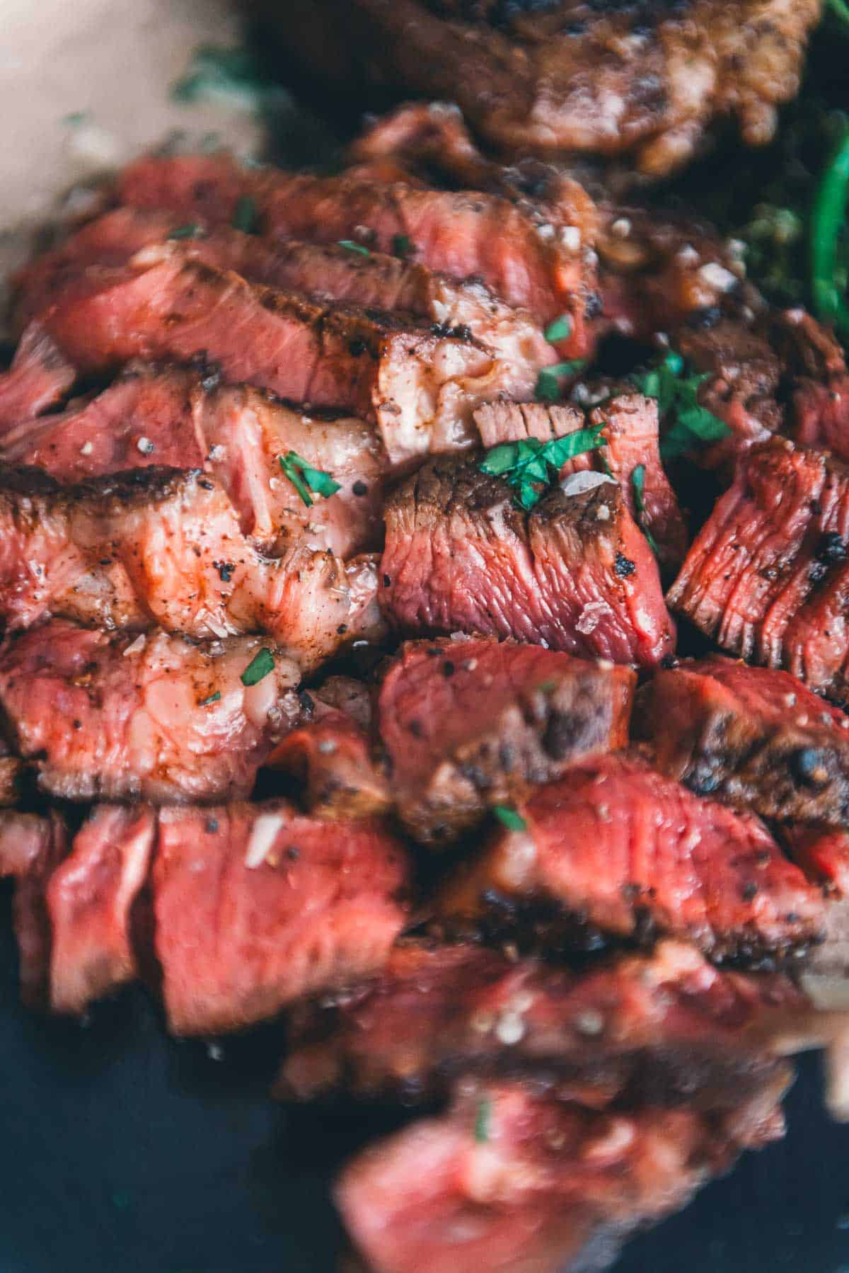 Close up of succulent sliced steak to highlight juiciness and tenderness from sous vide cooking.