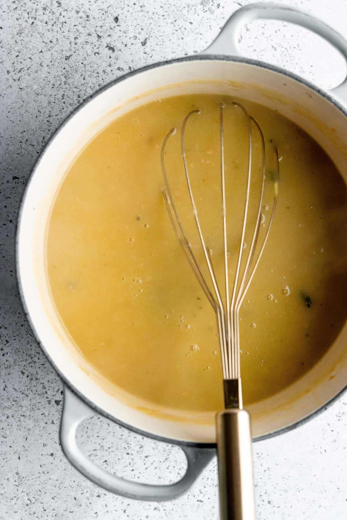 Showing the smooth thick roux in the pot. 