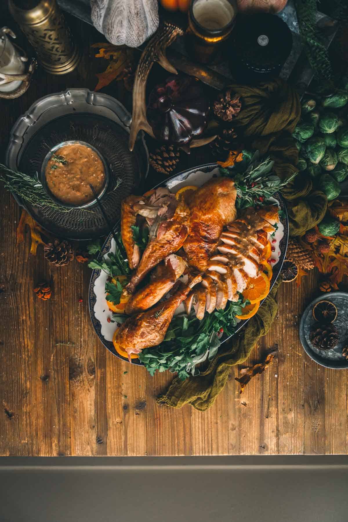 Carved roast turkey on a serving platter. 