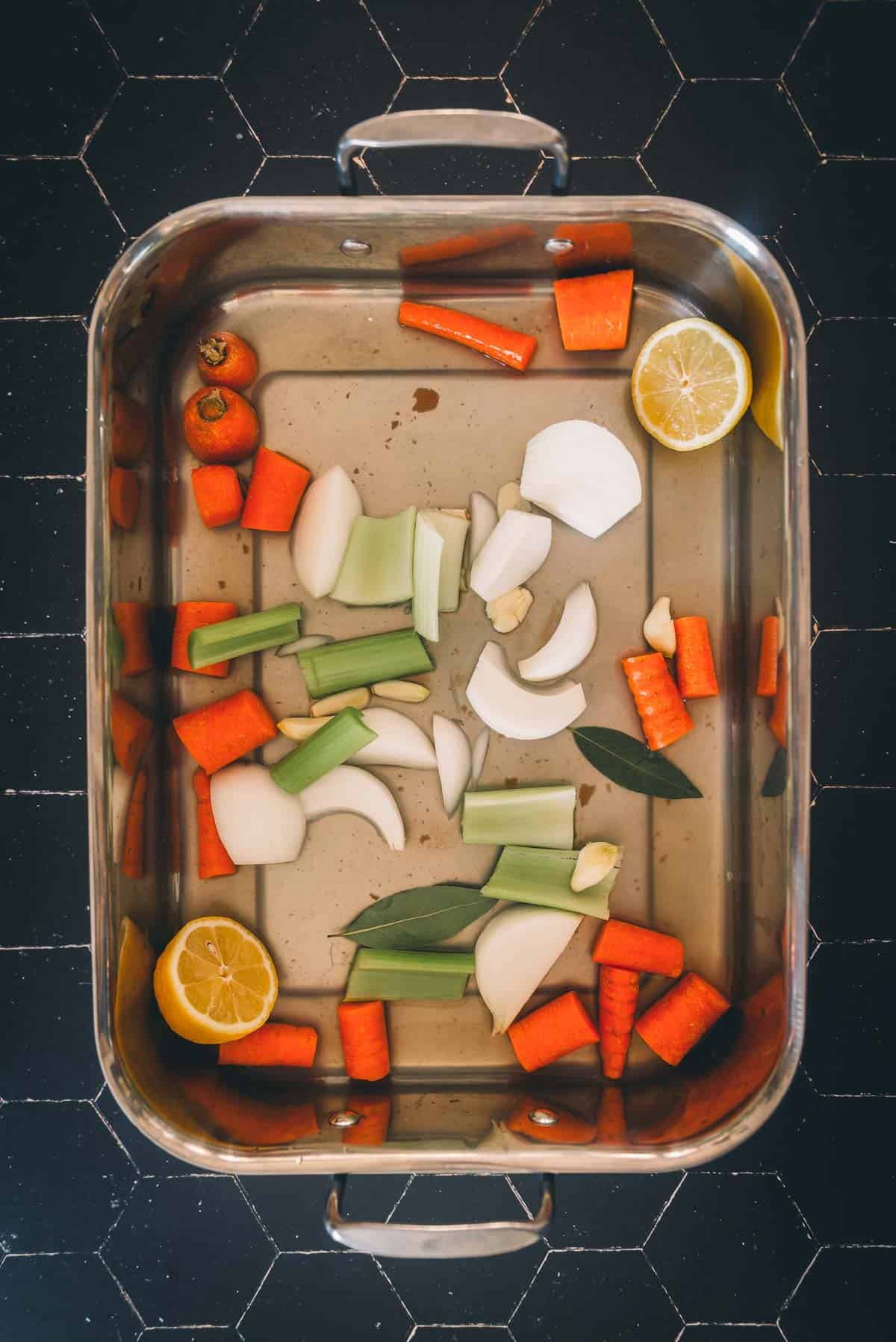 Veggies in a roasting pan.
