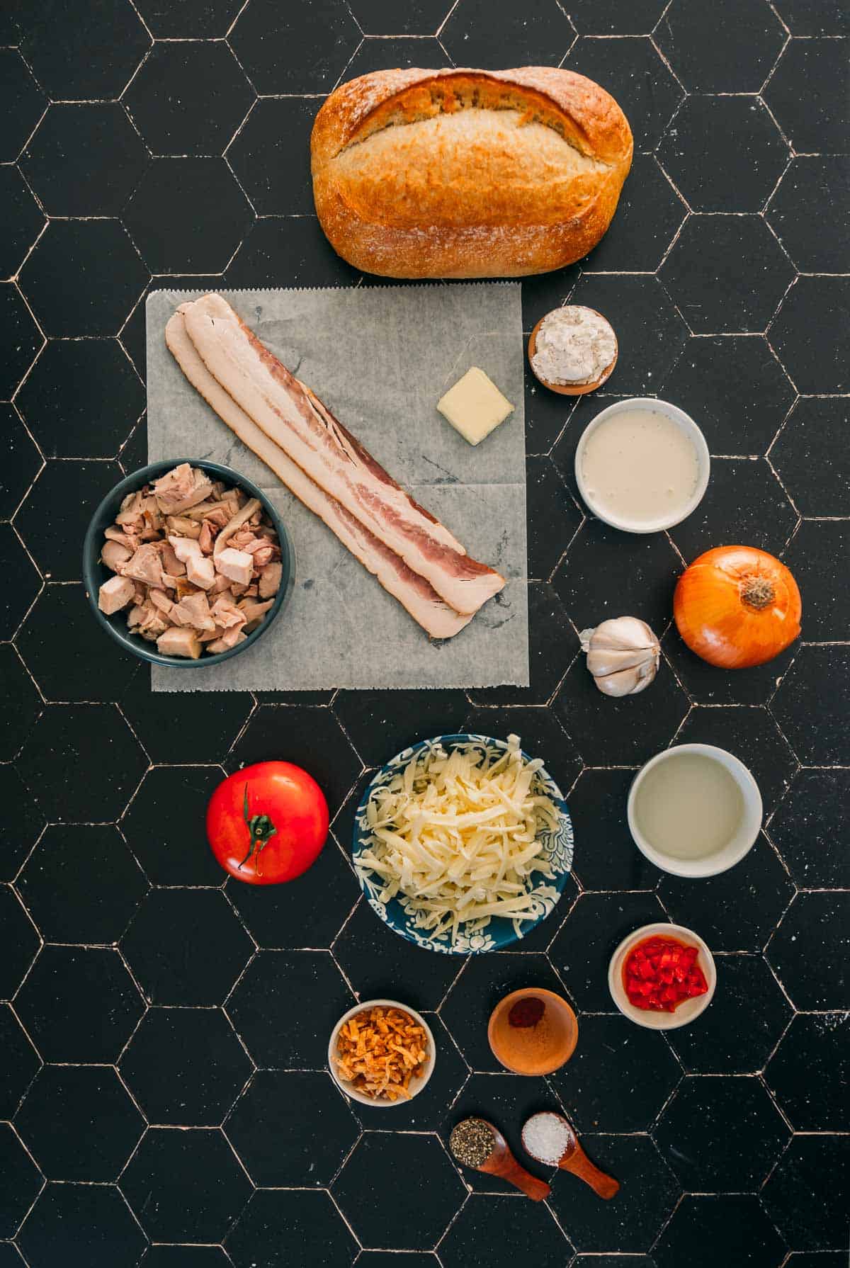 The ingredients for Kentucky hot brown sandwiches laid out on a table.