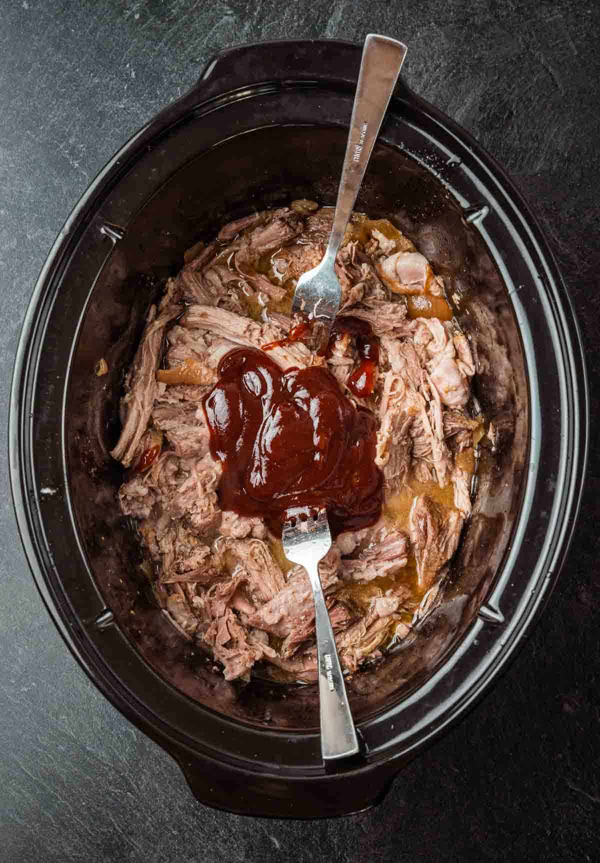 Slow cooker pulled pork with bbq sauce.
