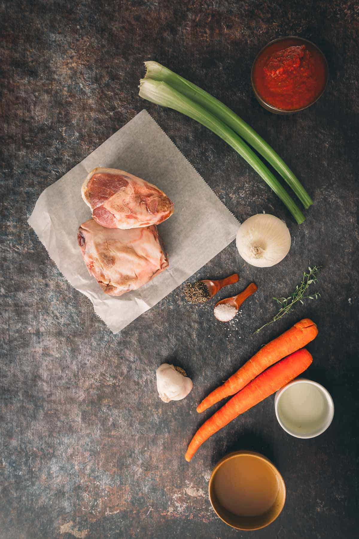 Ingredients for braised pork shanks on a table.