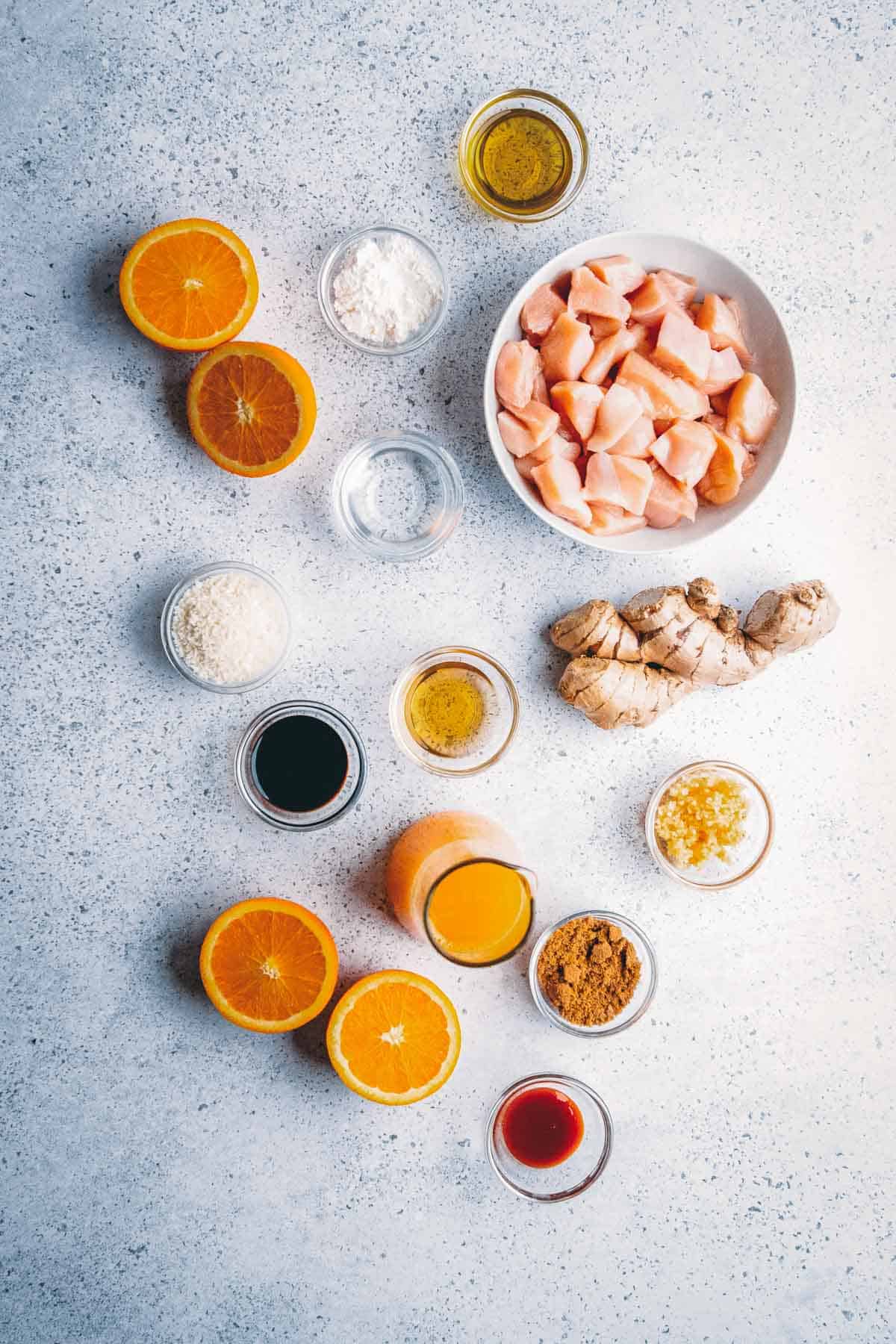 Ingredients for orange chicken in the air fryer on a counter.