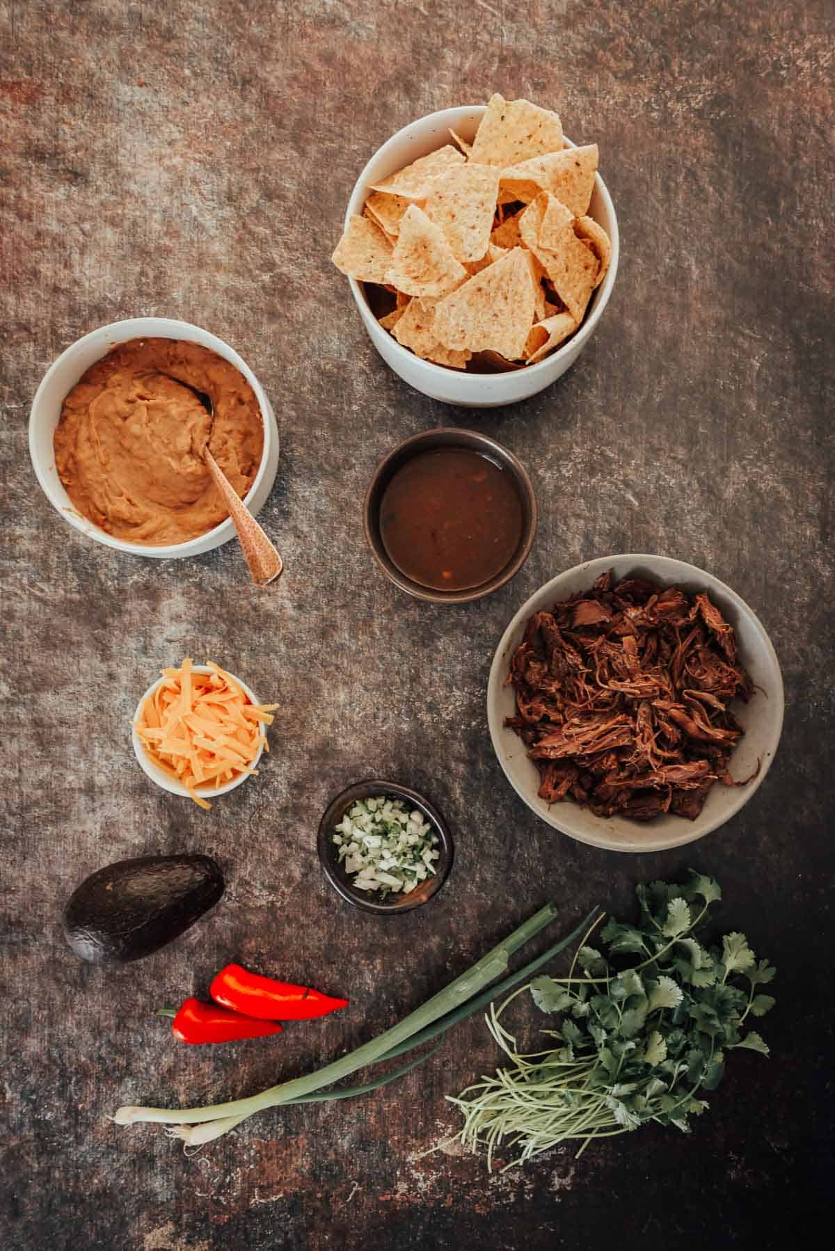Ingredients for Birria nachos with leftover birria.
