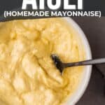 Pinterest image for a bowl of roasted squash aioli with a spoon, textured as homemade mayonnaise, with text overlay about how to make it and suggested food pairings.