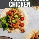 Pinterest image for instapot pulled chicken with pulled chicken tacos on a white surface.