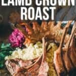 Image showing a grilled lamb crown roast with couscous and vegetables on a platter. Text reads, "How to Make Grilled Lamb Crown Roast." The recipe is available on girlcarnivore.com.