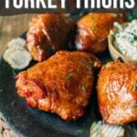 Pinterest image for smoked turkey thighs recipe.