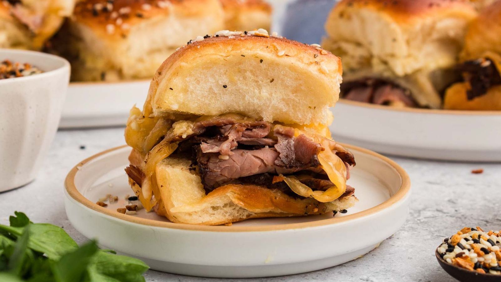 Roast beef sliders with tender beef and creamy horseradish sauce.