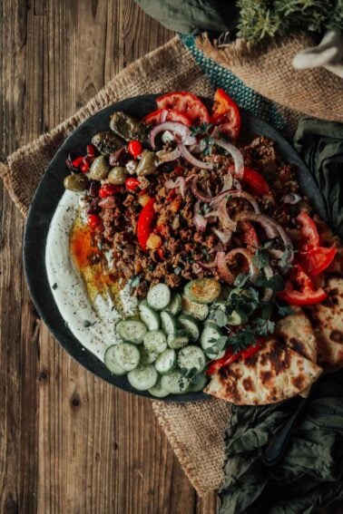 Mediterranean lamb recipe with tomatoes, cucumber, and olives