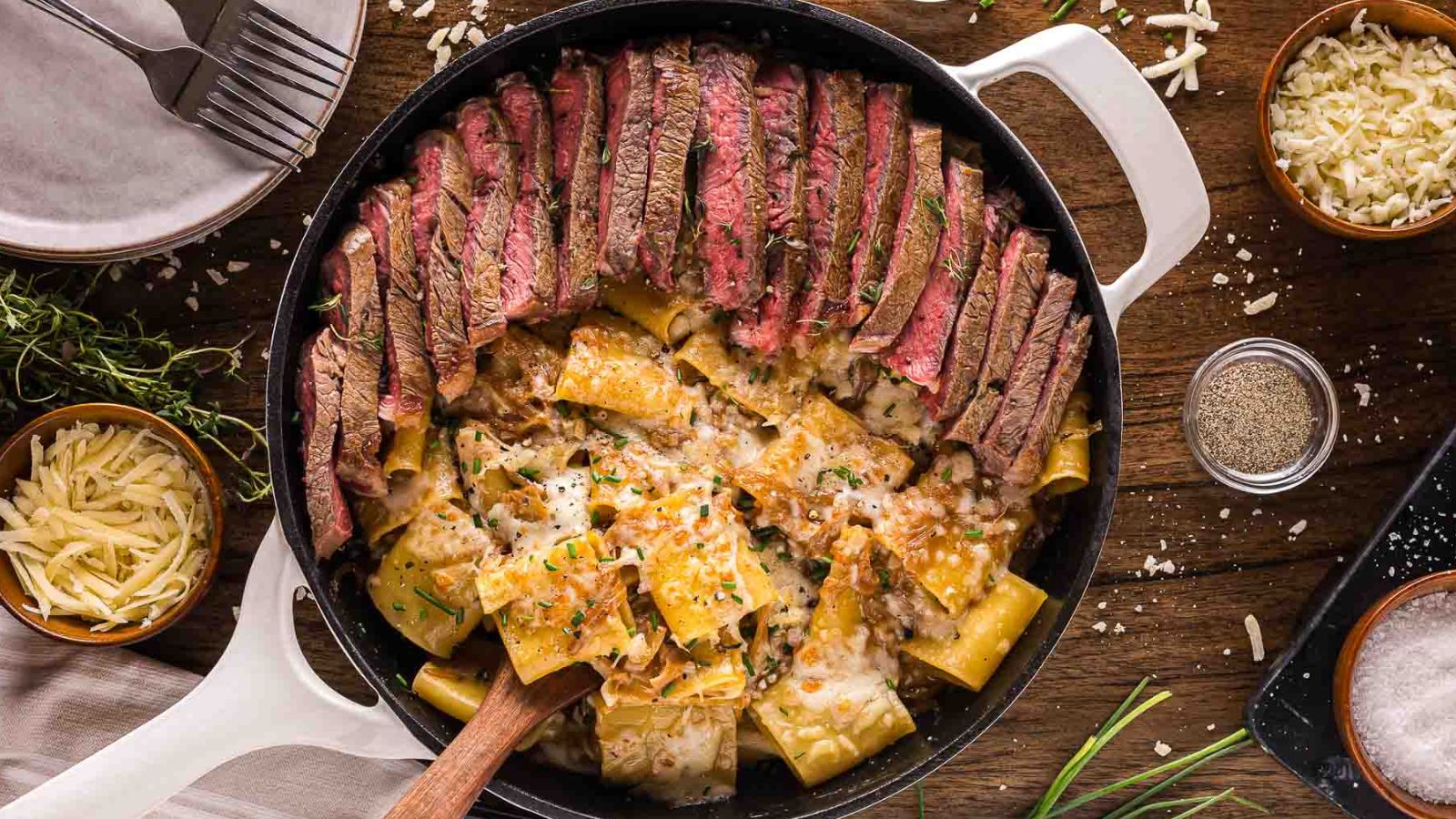French onion pasta topped with tender steak slices.