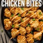 A plate of breaded air fryer chicken bites topped with bang bang sauce on the side. Text on image: "How to Make Air Fryer Bang Bang Chicken Bites.