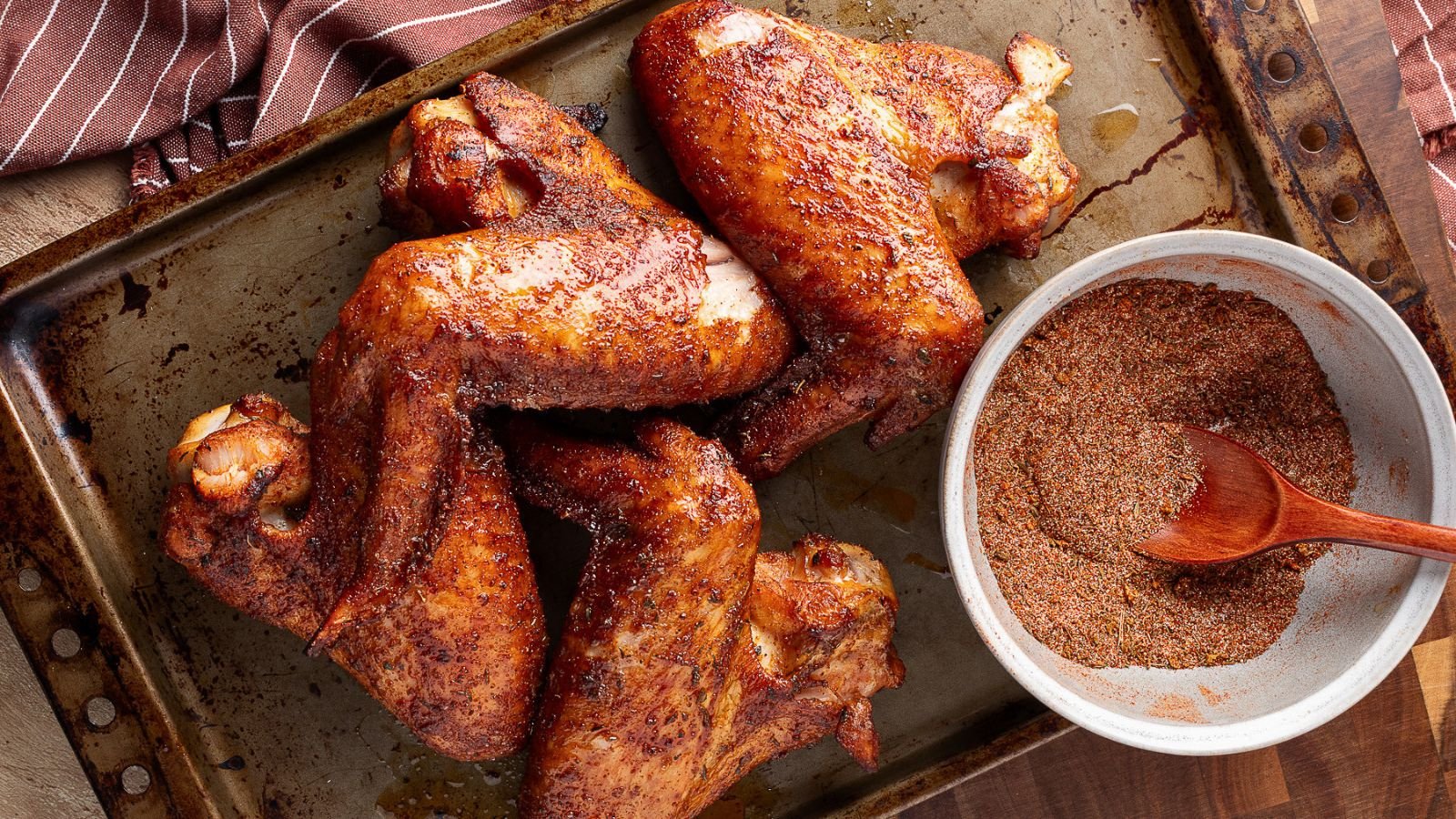 Cajun-seasoned smoked turkey wings with a crisp exterior and juicy meat.