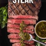 Sliced medium-rare flank steak on a black plate, topped with chimichurri sauce, garnished with herbs, and accompanied by a small bowl of chimichurri. Text overlay reads "How to make chimichurri steak.