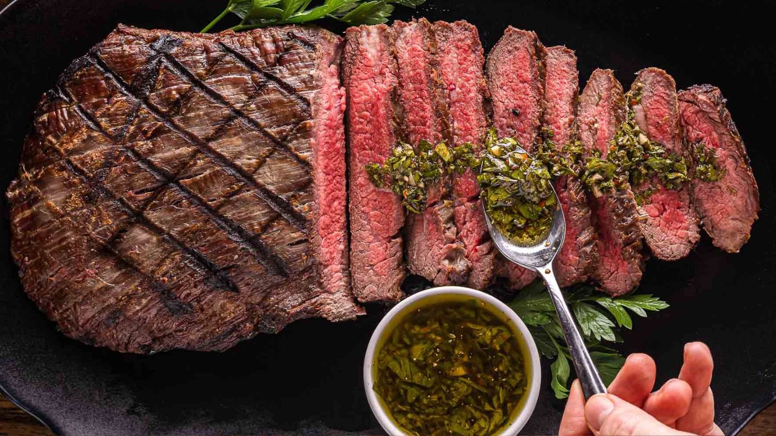 Chimichurri steak grilled hot and topped with bright herb sauce.