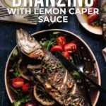 Whole roasted branzino garnished with lemon slices, capers, and cherry tomatoes on a plate, with text promoting a recipe for roasted branzino with lemon caper sauce.