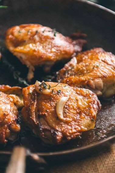 chicken thighs in a skillet